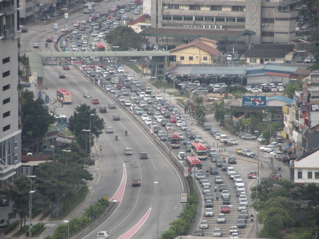 "Traffic Jam On Old Klang Road" by thienzieyung is licensed under CC BY 2.0.